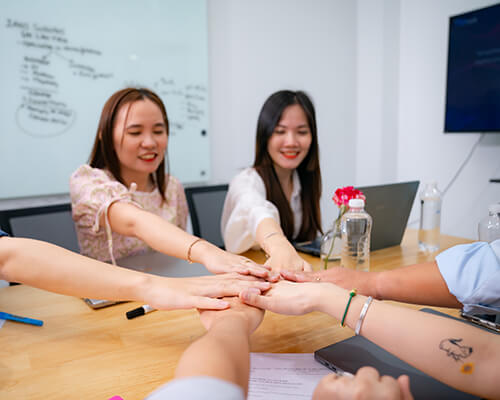 Team huddle in a meeting
